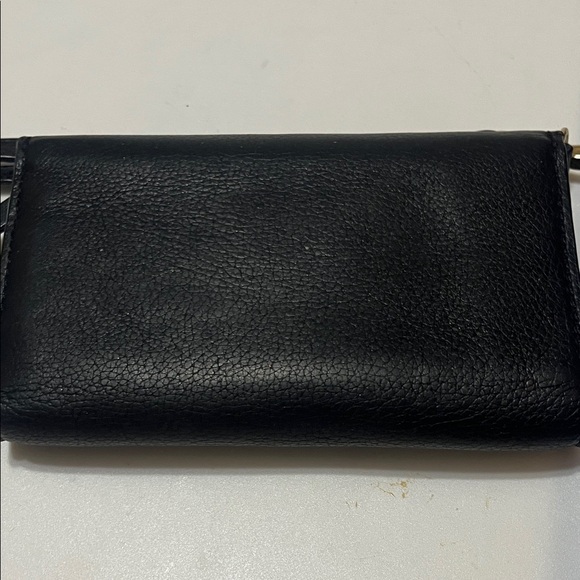 Michael Kors Black and Gold Wristlet - Picture 10 of 10